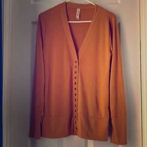 NWOT snap cardigan size Large.